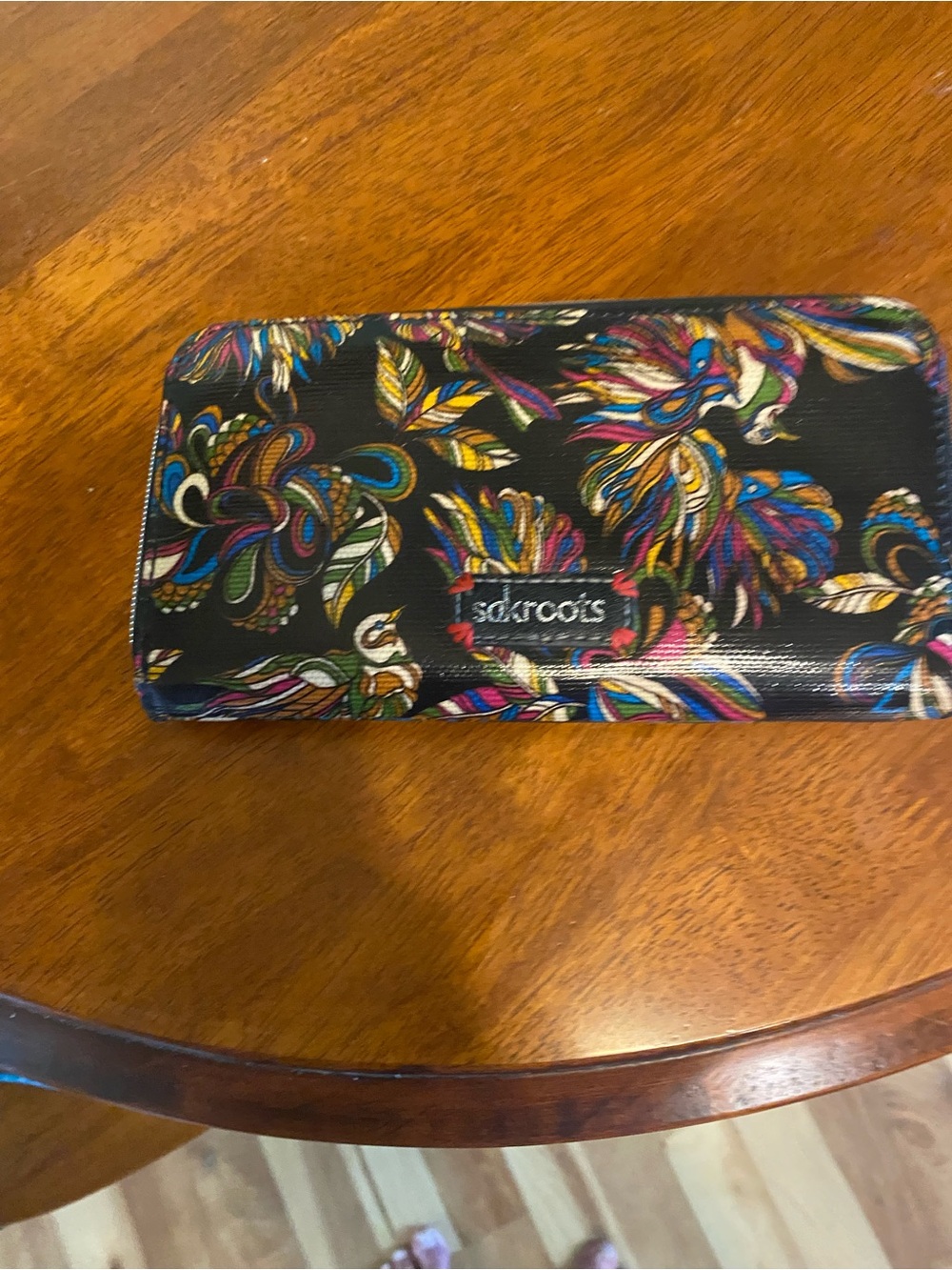 Zip around wristlet/wallet from the brand Sakroots